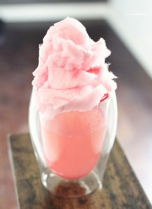 Cotton Candy Margarita | This Cotton Candy Margarita recipe is going to be your new favorite! Yes, there is pink cotton candy inside and it's so good. | Perfect summer cocktail to make with your girlfriends!