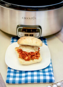Chicken Parmesan Sandwich in the Crock Pot is super easy and tastes really great. All you need is your Slow Cooker and just four ingredients.