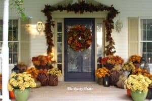 porch with grapevine pumpkins